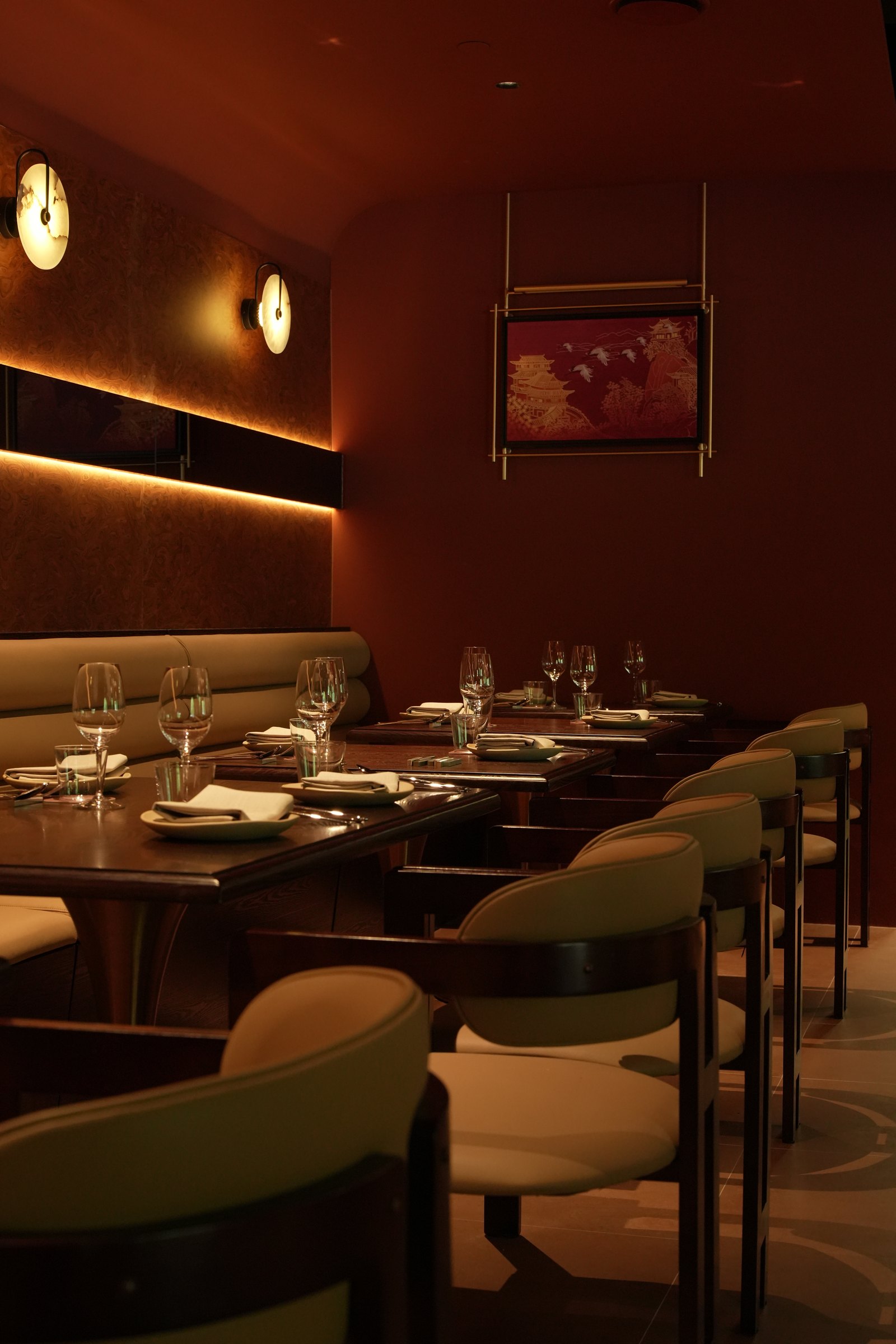 Dining tables and chef counter at Liora